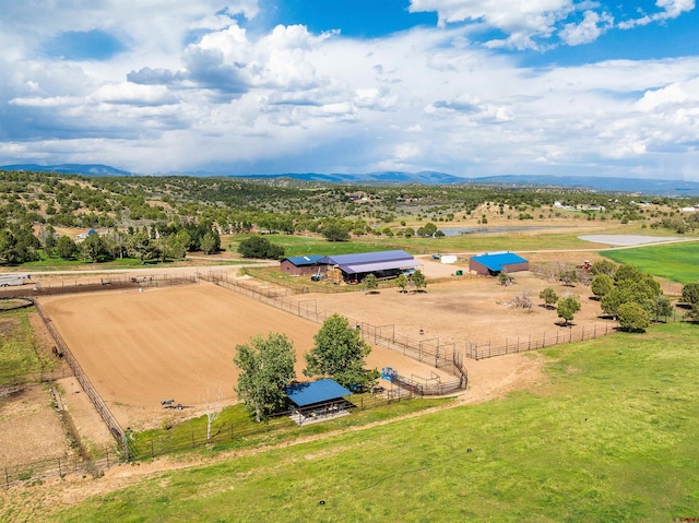 bird's eye view featuring a mountain view and a rural view