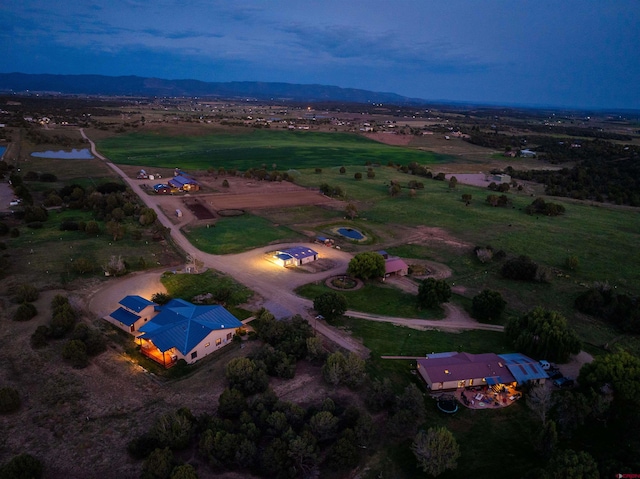 aerial view at dusk with a rural view