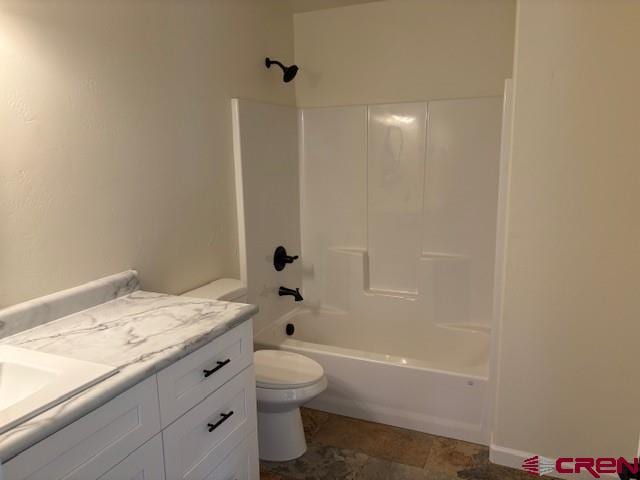 full bathroom featuring vanity, toilet, and bathing tub / shower combination