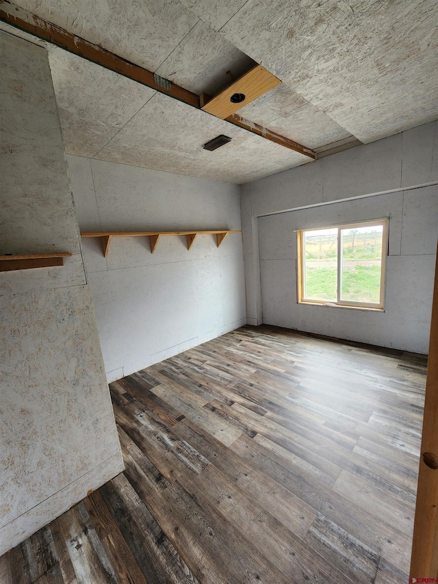 empty room featuring hardwood / wood-style floors