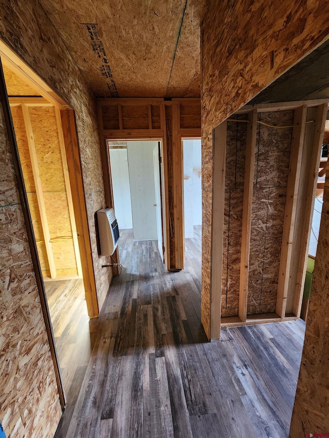 hallway with dark wood-type flooring