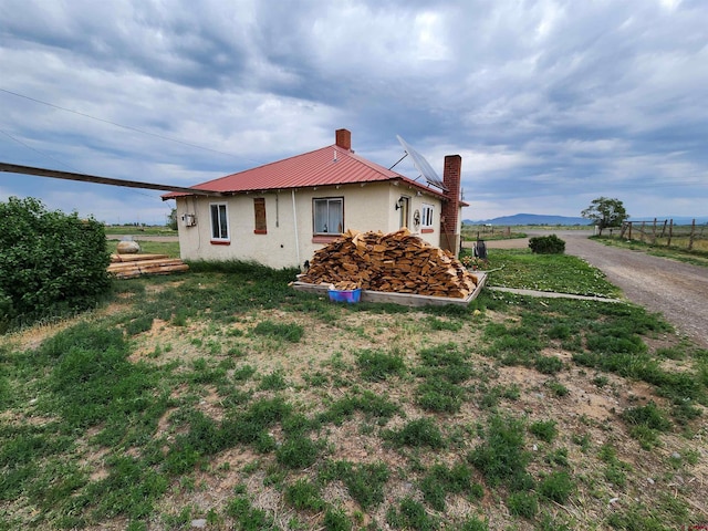 view of home's exterior featuring a yard