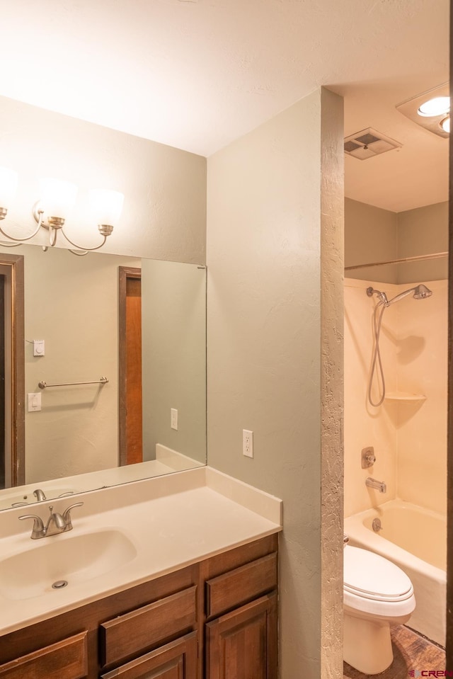 full bathroom with vanity, toilet, and bathing tub / shower combination