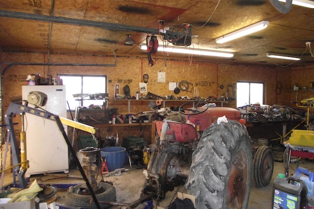 garage with a workshop area