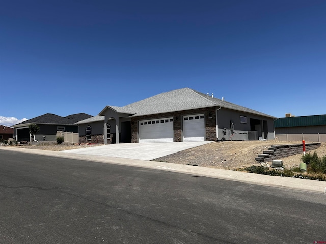 view of front of home with a garage