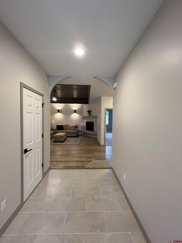 corridor featuring light hardwood / wood-style floors