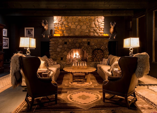 living area with carpet and a fireplace