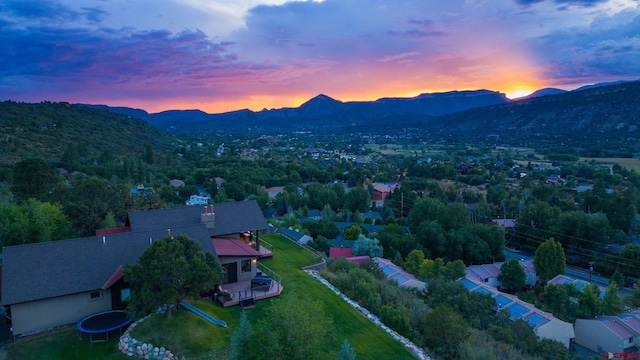 aerial view at dusk with a mountain view