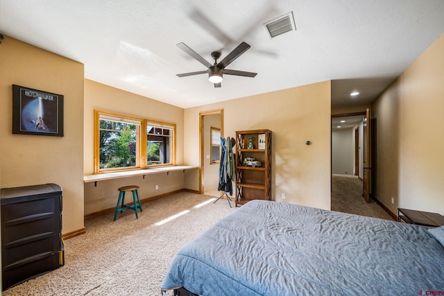 bedroom featuring ceiling fan and carpet floors