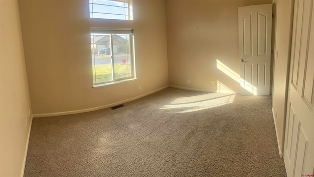 view of carpeted spare room