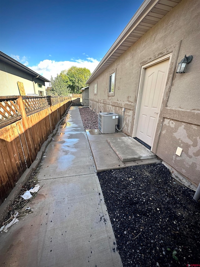 view of patio with central AC