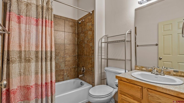 full bathroom with vanity, toilet, and shower / bath combination with curtain