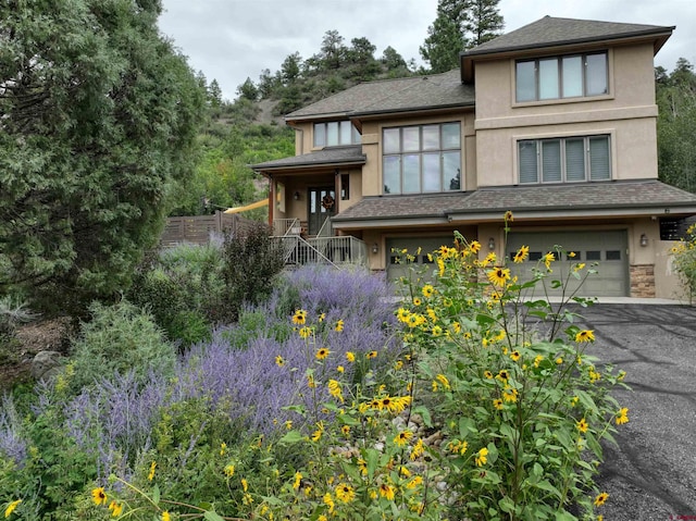 view of front of house with a garage