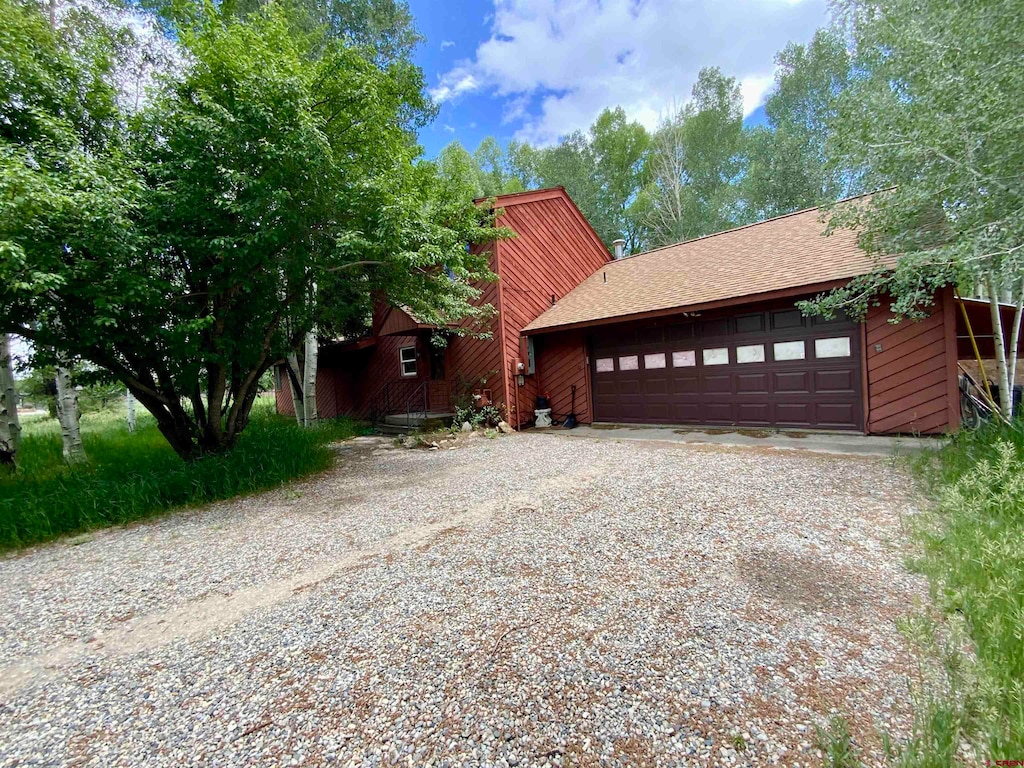 view of front of property with a garage