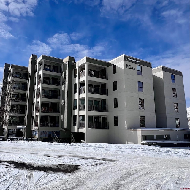 view of snow covered property