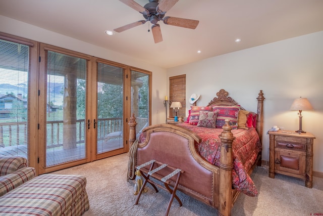 bedroom with french doors, ceiling fan, light carpet, and access to exterior