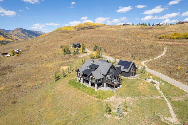 aerial view featuring a mountain view and a rural view