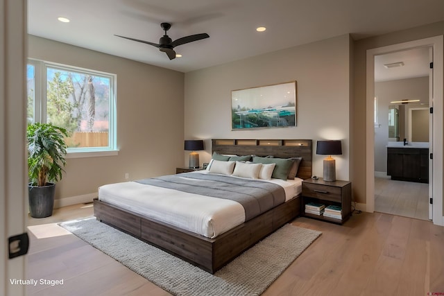 538 Hermosa Meadows Rd, Durango, CO 81301 - bedroom featuring baseboards, recessed lighting, light wood-style flooring, connected bathroom, and ceiling fan