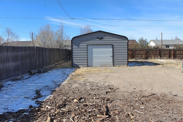 view of outbuilding featuring a garage