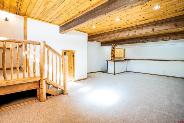 interior space featuring light carpet, wood ceiling, and beamed ceiling