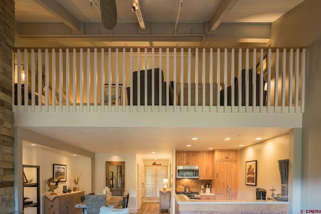 interior space featuring beamed ceiling