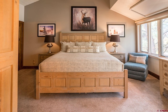 bedroom with light carpet and vaulted ceiling