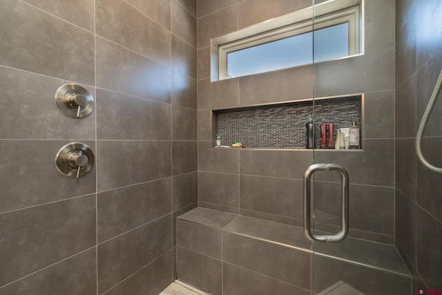 bathroom featuring walk in shower