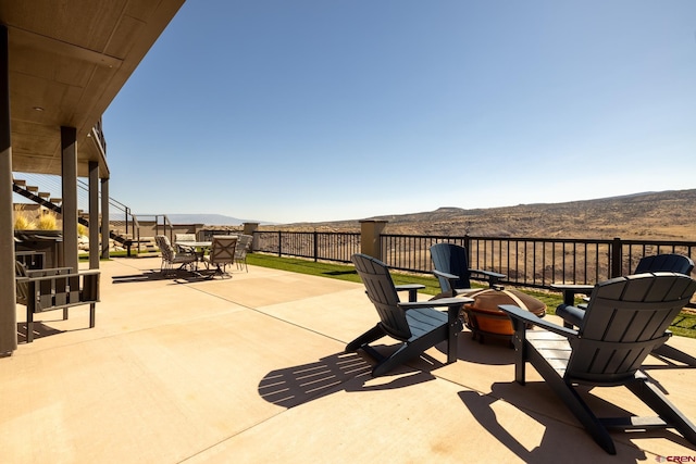 view of patio with a mountain view