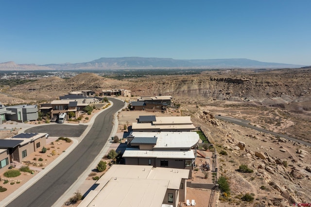 drone / aerial view featuring a mountain view