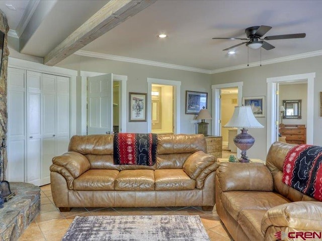 living room featuring ceiling fan, beam ceiling, light tile patterned floors, and crown molding