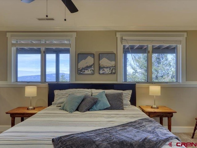 bedroom with carpet flooring and ceiling fan