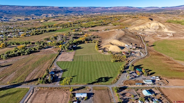 aerial view featuring a mountain view and a rural view