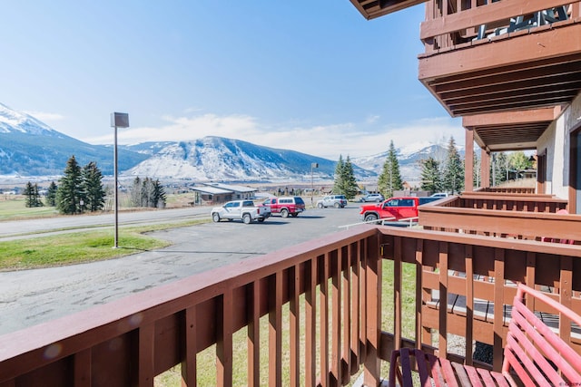 balcony featuring a mountain view