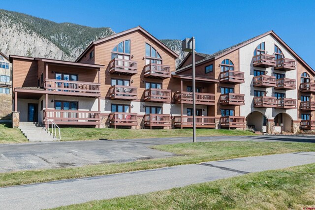 view of building exterior with a mountain view