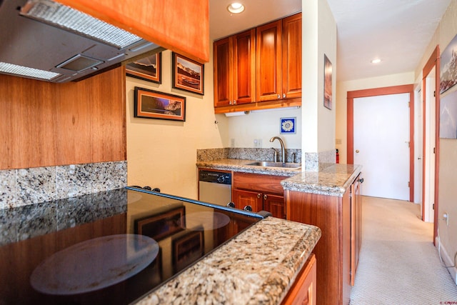 kitchen with light stone counters, sink, stainless steel dishwasher, light colored carpet, and a center island