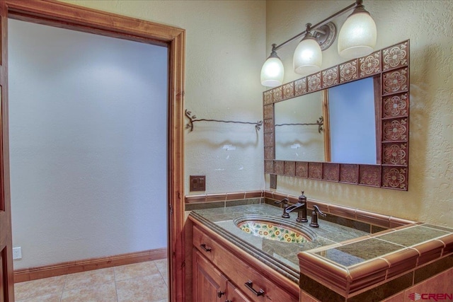 bathroom featuring vanity and tile patterned floors