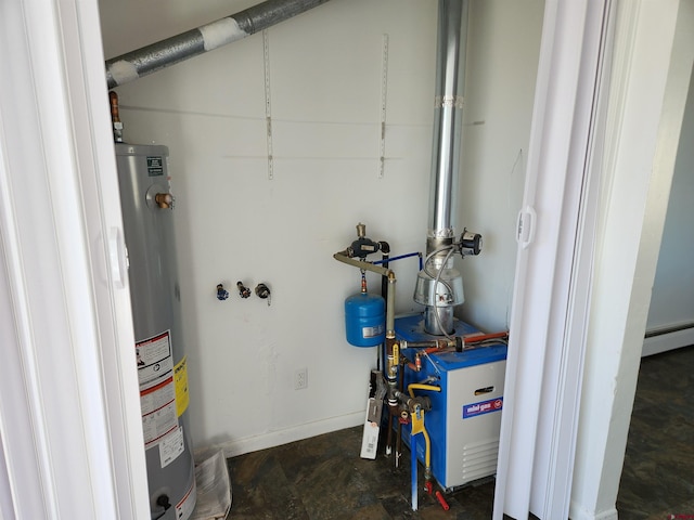 utilities with gas water heater and a baseboard heating unit