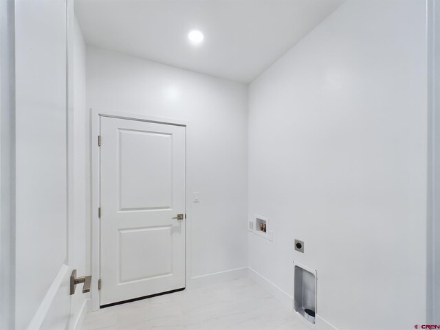 1013 Bluffs Blvd, Cortez, CO 81321 - laundry area with hookup for an electric dryer, washer hookup, baseboards, and recessed lighting