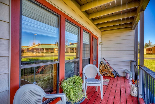 exterior space with wooden ceiling and beam ceiling