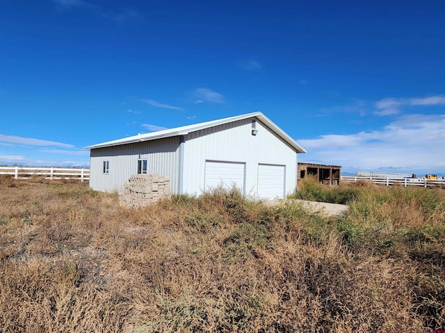 view of outdoor structure featuring a garage