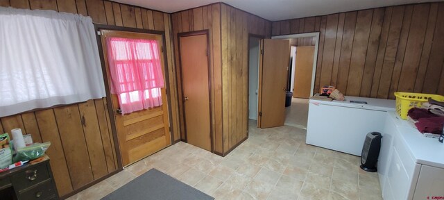 9966 Rd 7, Dove Creek, CO 81324 - clothes washing area with wooden walls