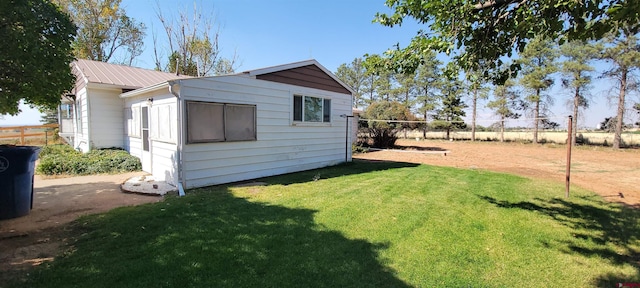 9966 Rd 7, Dove Creek, CO 81324 - rear view of property featuring metal roof