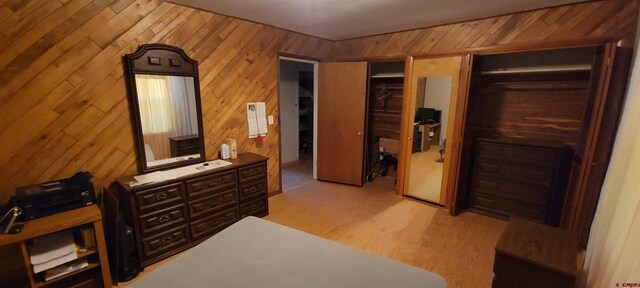 9966 Rd 7, Dove Creek, CO 81324 - bedroom with wooden walls and wood finished floors