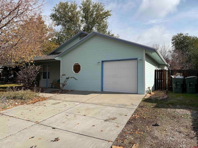 view of side of home with a garage