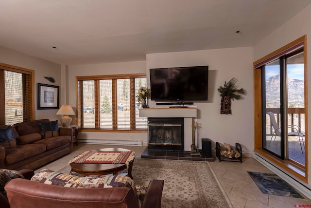 tiled living room with a baseboard heating unit