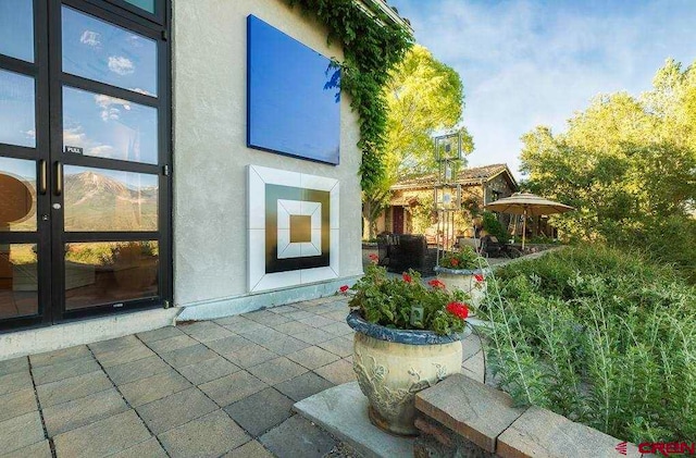 view of patio featuring french doors