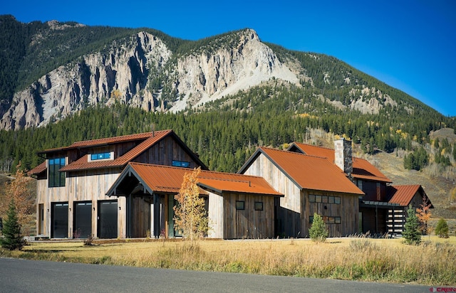 231 S Avion Dr, Crested Butte, CO 81224 - view of mountain backdrop featuring a forest