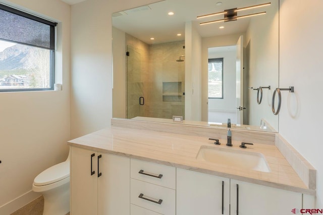 77 Coyote Ridge Rd, Crested Butte, CO 81224 - bathroom with vanity, toilet, recessed lighting, baseboards, and a stall shower