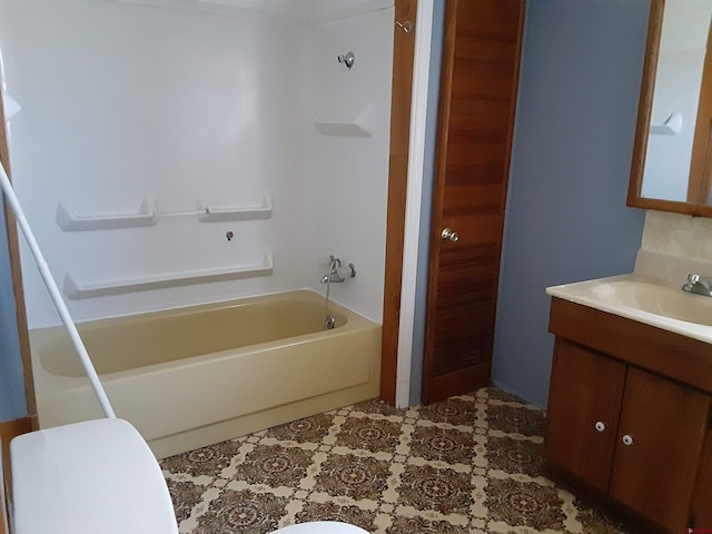 full bathroom featuring toilet, vanity, and shower / washtub combination