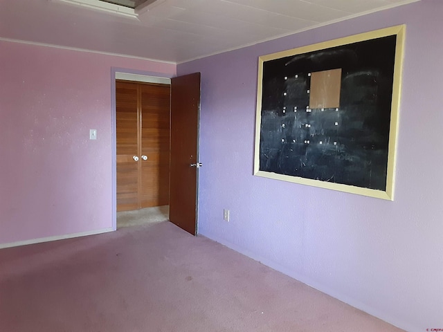 unfurnished room with carpet floors